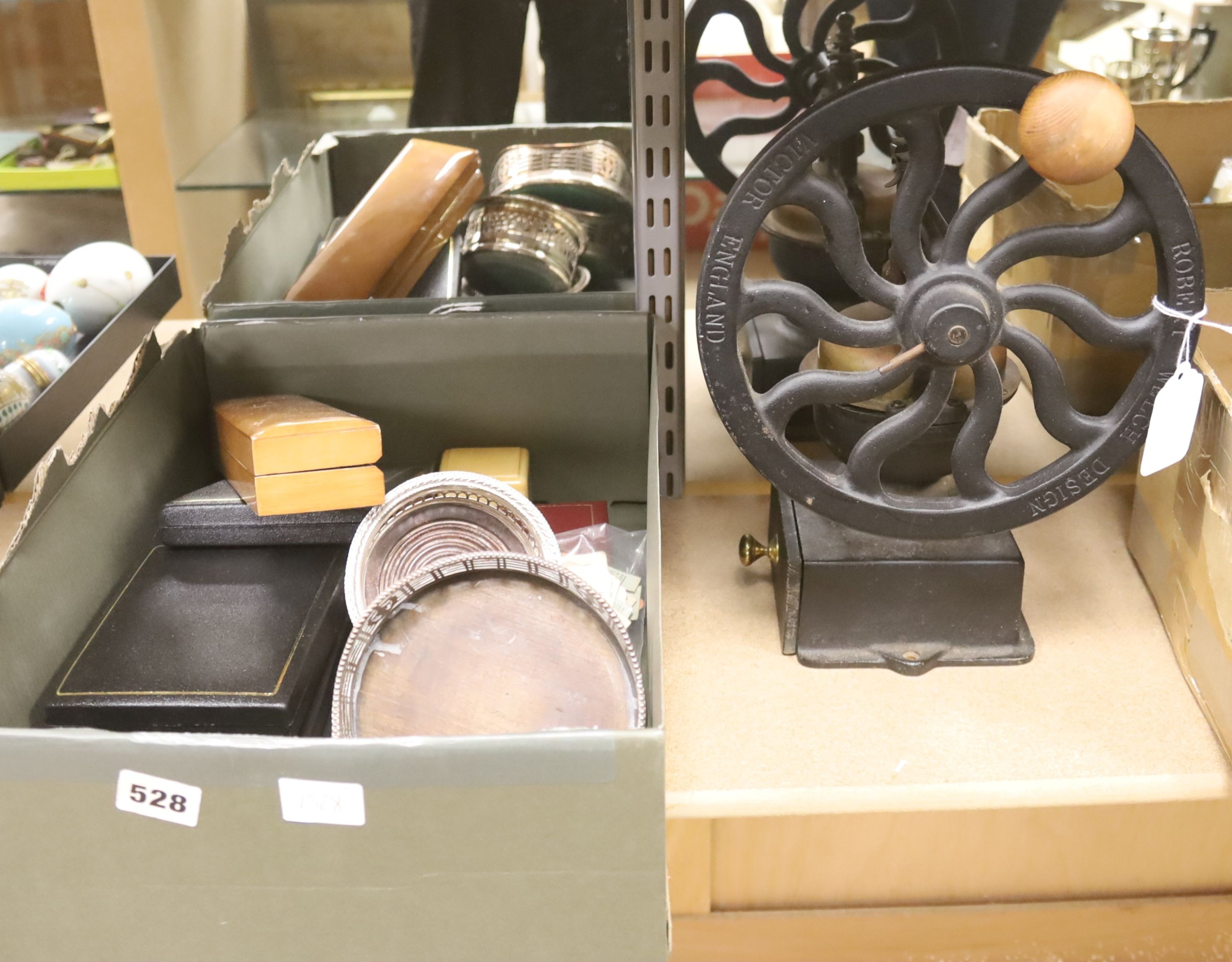 A coffee grinder, coin boxes, a silver plated coaster, etc.